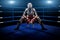 Boxing woman sitting alone in the boxing arena , surrounded by blue lights