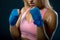 Boxing woman. Young woman fighter ready to fight. Strong woman. Female hands wrapped in boxing bandage.