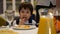 Boy 3-4 years to eat French fries and drink juice