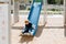 Boy 3 years old rides slide playground. Concept of spending active time on street during holidays