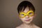 Boy 5 years old close up in yellow swimming goggles