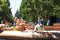 A boy, aged 6-8 rides a mechanical bull at a Independence Day celebration.