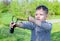 Boy Aiming Sling Shot