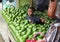 Boy with avocados at the market