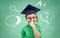 Boy in bachelor hat and eyeglasses over blackboard