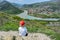 A boy on the background of a view of the Mtkvari River flowing into the Aragvi River. Mtskheta Georgia 2019