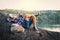 Boy backpacker sleeping on the rock in nature