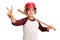 Boy with baseball bat and helmet making victory sign