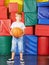 Boy with basketball in gym