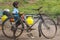 Boy with bike at Dubare Elephant Camp, Coorg India.