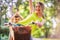 Boy on bike with mother - lovely family having quality time outdoors