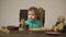 Boy bites a large piece of pizza isolated on a white background. Cute little caucasian boy eating pizza. Hungry child