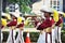 Boy blowing trumpet in marching band festival