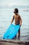 Boy with bodyboard in sea