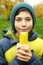 Boy with boiled gold corn