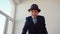 Boy Boss in Classical Suit and Hat Talk to Camera