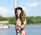 Boy catching a fish in Michigan lake during summer, fishing activity with family. Fun child.