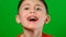 A boy of Caucasian nationality demonstrates a plate for straightening crooked and deformed teeth.