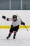 Boy celebrating scoring a goal in ice hockey