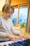 Boy with chickenpox playing piano