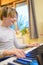 Boy with chickenpox playing piano