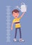 Boy at child height growth chart with watering can