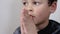 Boy child praying to God with hands together stock footage