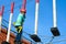 Boy child steps on wooden boards on the obstacle course in an amusement park, outdoor activities, rock climbing, danger, training,