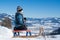 Boy child in winter on sled