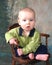 Boy Child on Wooden Chair