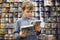 Boy chooses one of two dvd in special store