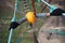 Boy climber walks on the rope bridge