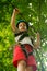 boy at climbing activity in high wire forest park