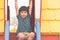 Boy climbing down the playground house