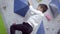 Boy climbing indoor rock wall