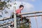 Boy Climbing Netting Playground