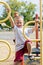 Boy Climbing Up Jungle Gym On Playscape