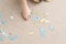 Boy collecting puzzle with world animals