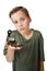 Boy with compass inquiring look on white