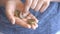 Boy counting Euro coins in his hands. Kid saving money. Child counting his savings