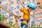 boy crossing course high ropes element in adventure park outdoor. Concept Climbing extreme sport, physical development