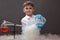 Boy doing experiments in the laboratory. Experiments with liquid nitrogen. Science and education.