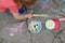 Boy drawing with chalk crayons