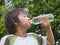 Boy drinking mineral water