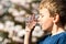 Boy drinking pure water from glass