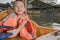 Boy driving boat