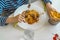 Boy eating Duck breast fillet served on a white plate, fried with garlic, special asiatic soy sauce recipe