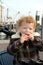 Boy eating Fish in Harbour