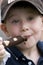 Boy Eating Frozen Chocolate Covered Banana