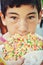 Boy Eating Giant Cookie